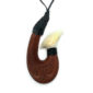 Bone wood fishhook koru pattern carving